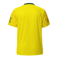 Rear view of the Australian cricket team jersey in bright yellow with championship years listed on the sleeves and a green collar.