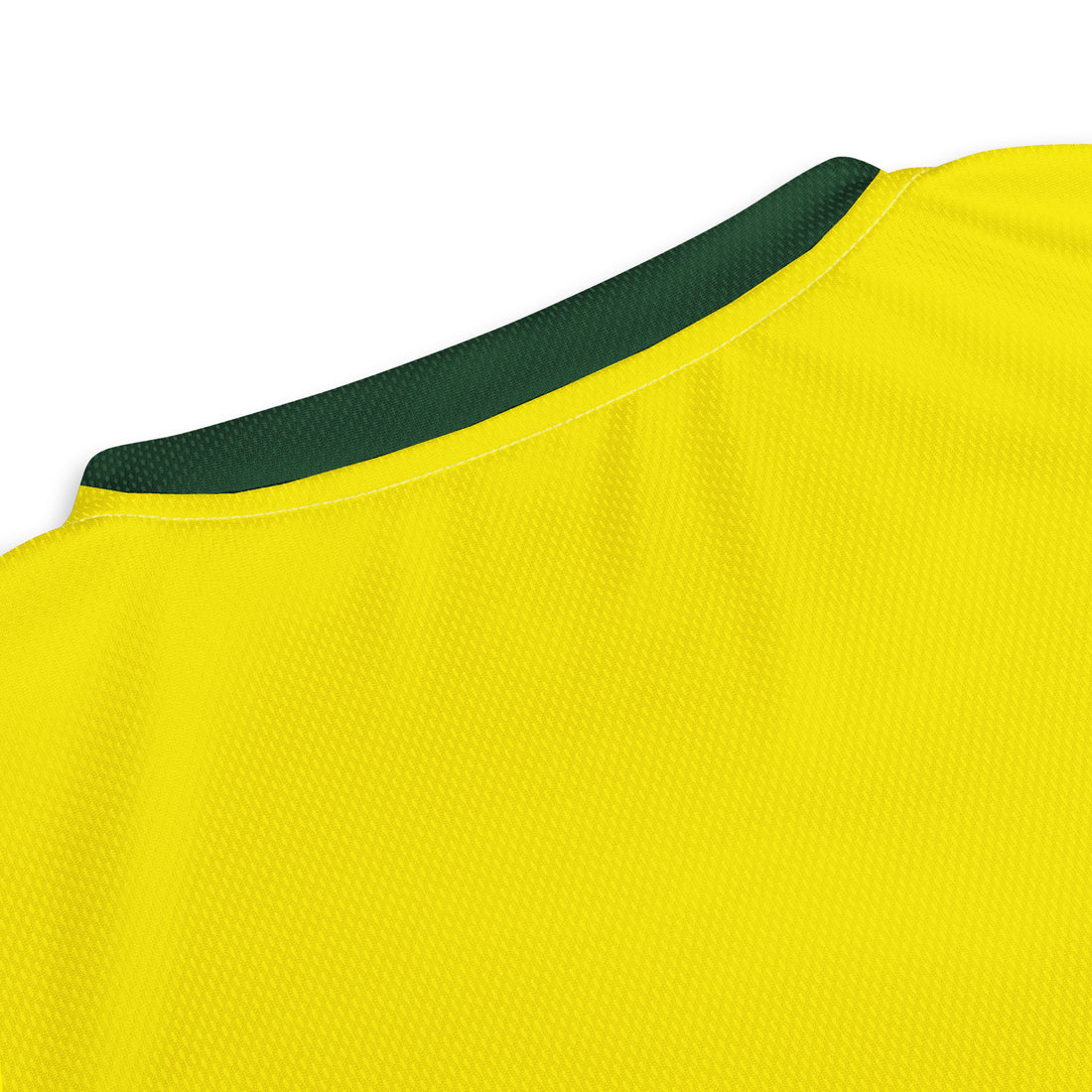 Close-up view of the upper back of the Australian cricket team jersey showcasing the vibrant yellow fabric with subtle textural details.