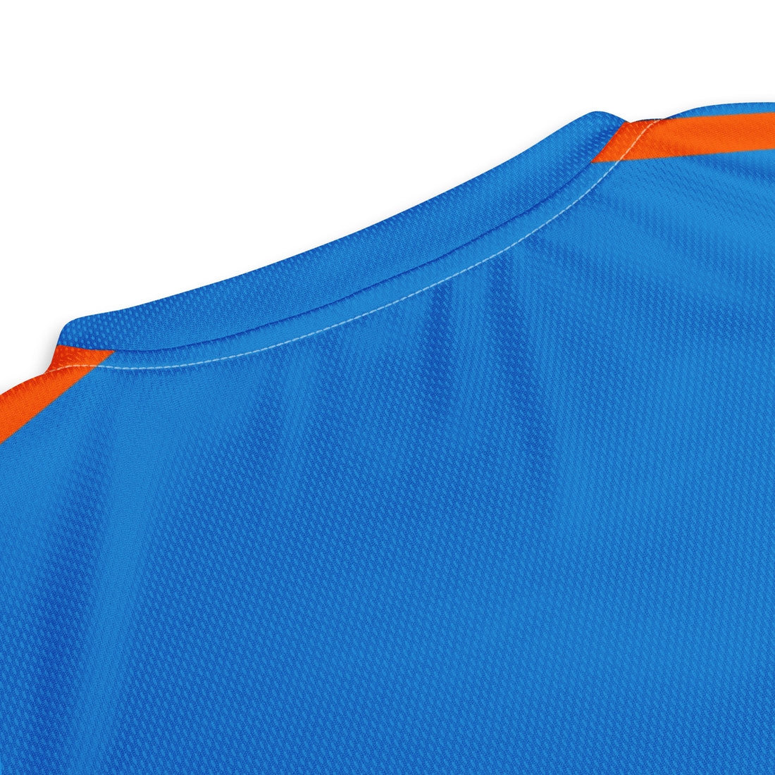 Close-up view of the back of a blue sports jersey with orange accents on the shoulder.