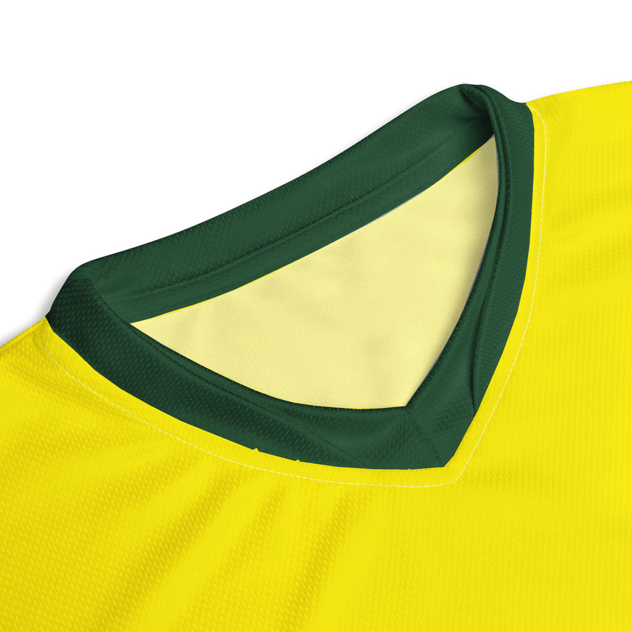 Detailed view of the V-neck collar of the Australian cricket team jersey, featuring contrasting green and yellow layers.