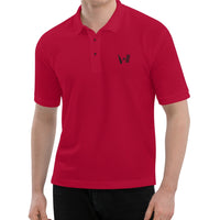 Man in a bright red polo shirt with the Bat Ball Wicket logo on the chest, ready for a stylish day on the cricket field.