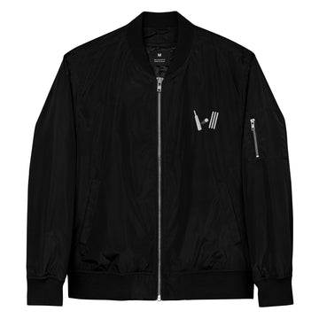 Black bomber jacket featuring a sleek design with a silver zipper, zippered sleeve pocket, and a minimalist white cricket bat and stumps logo on the chest.