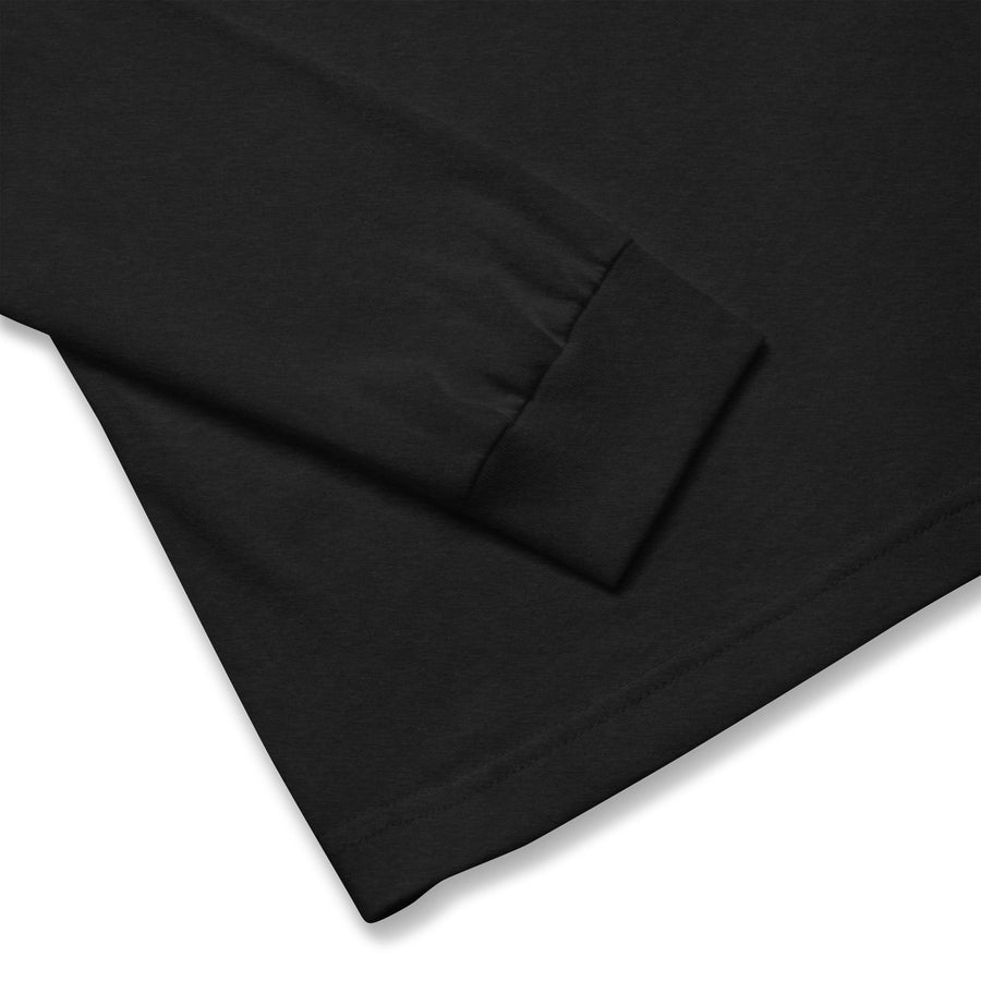 Close-up of sleeve cuff on a black long sleeve tee from Bat Ball Wicket.