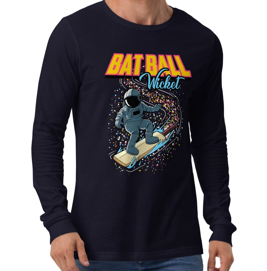 Model wearing the Bat Ball Wicket long sleeve tee in navy, featuring a vibrant cosmic cricket design with an astronaut.