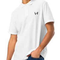 Young man smiling in a smart white Bat Ball Wicket polo shirt, embodying casual elegance and a love for cricket.