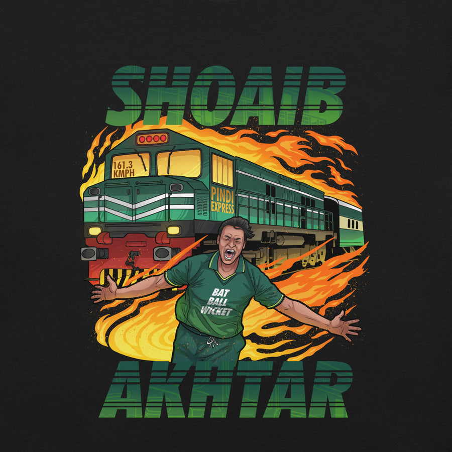 Front view of a black t-shirt featuring a detailed graphic of Shoaib Akhtar with a train and flames, emphasizing speed and energy, with 'Shoaib Akhtar' in prominent green lettering.