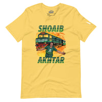 ront view of a yellow t-shirt showcasing a large graphic of cricketer Shoaib Akhtar with a train and flame elements in a dynamic design, titled 'Shoaib Akhtar' in bold green letters below.